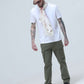 Model wearing Presso Olive cargo pants with 6 pockets, showcasing durability and style for modern explorers.