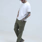 Model wearing Presso Olive cargo pants with six pockets, styled for adventure and comfort. Best cargo pants for men in India.